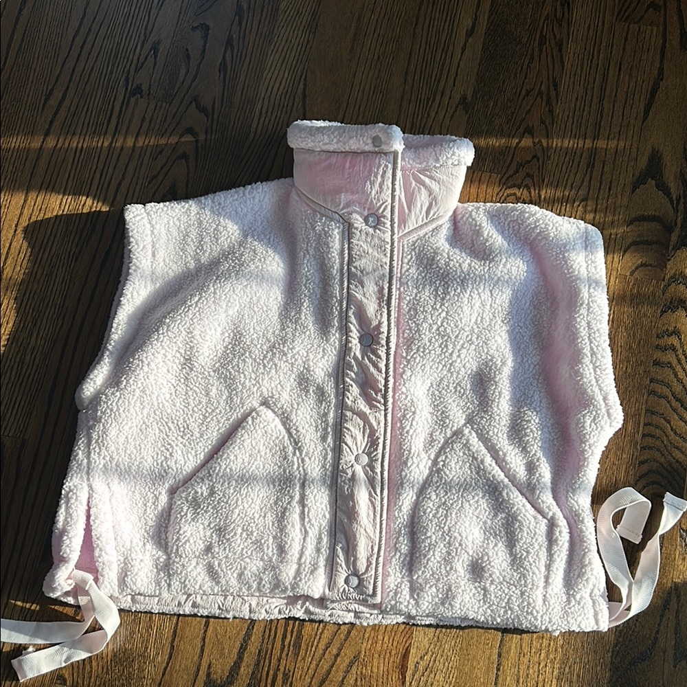 Free people movement Scout it out pink fleece vest. New w/o tag Size XS